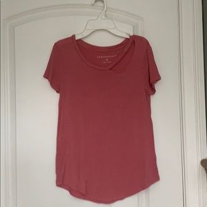 pink top with collar bone cut out